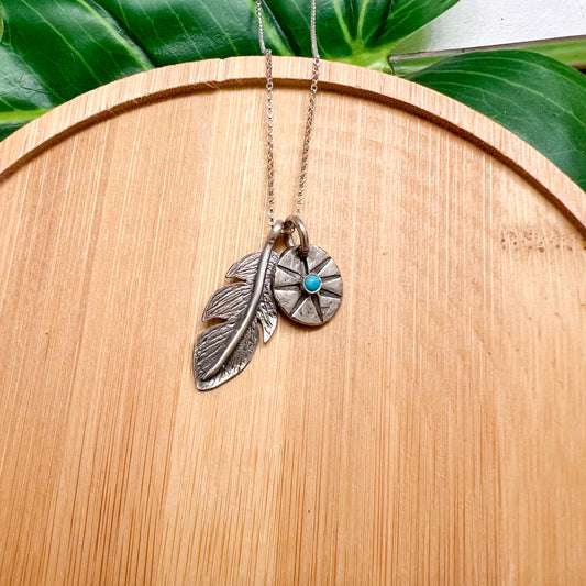 “Talisman” charm necklace